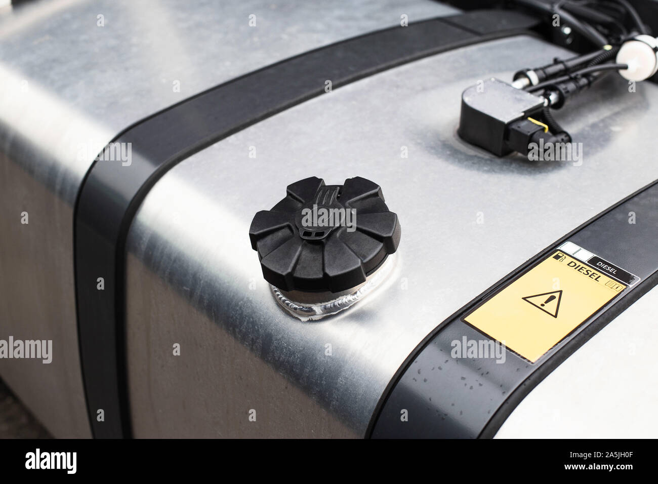 Tank with diesel fuel of a truck. Fuel economy concept while driving