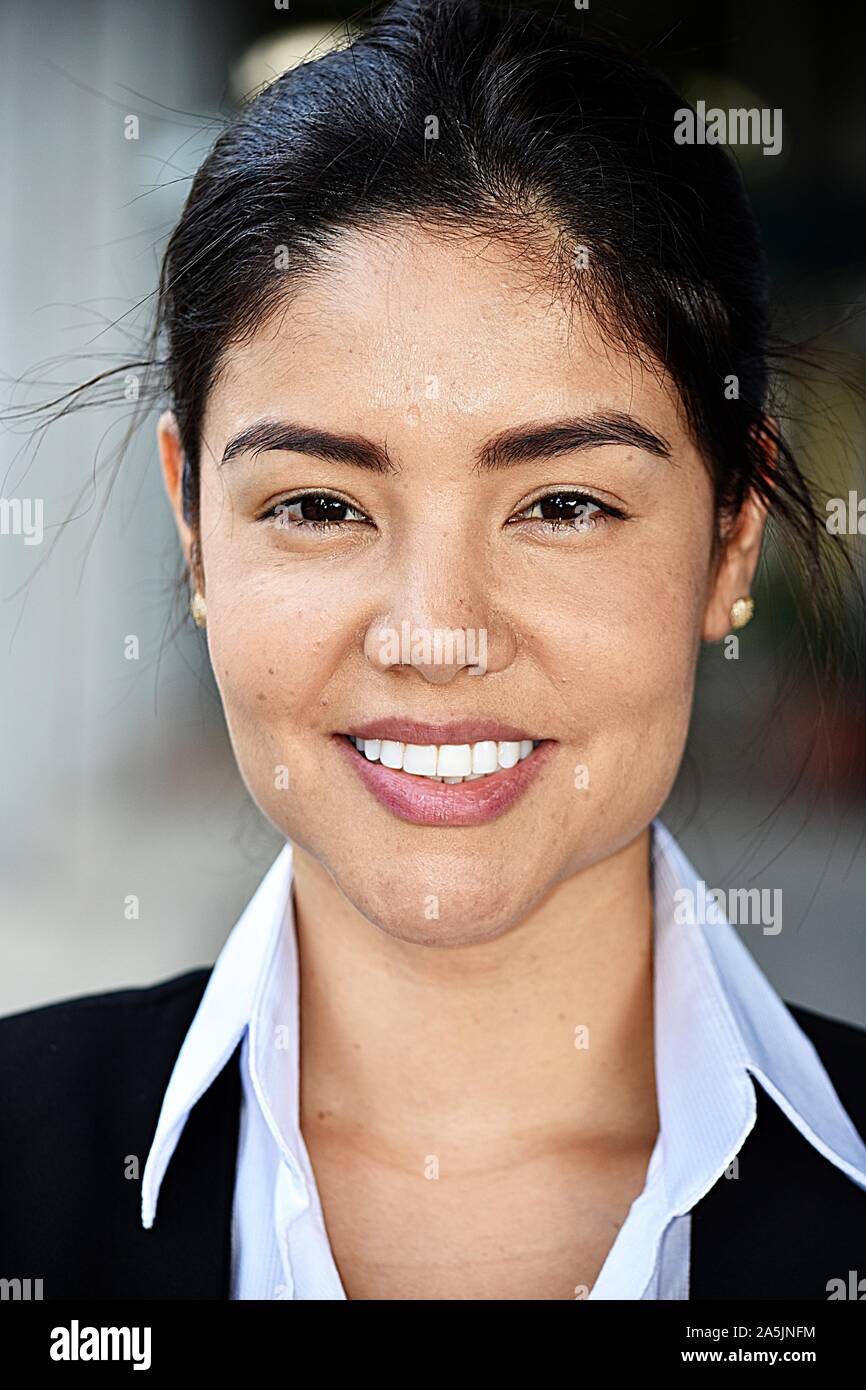 Smiling Attractive Business Woman Wearing Suit Stock Photo - Alamy