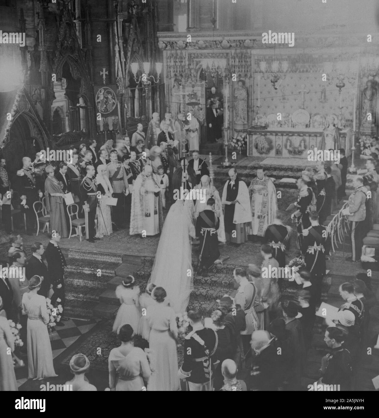 Prince George, Duke of Kent, and Princess Marina of Greece at the altar in Westminster Abbey during their wedding day. Stock Photo