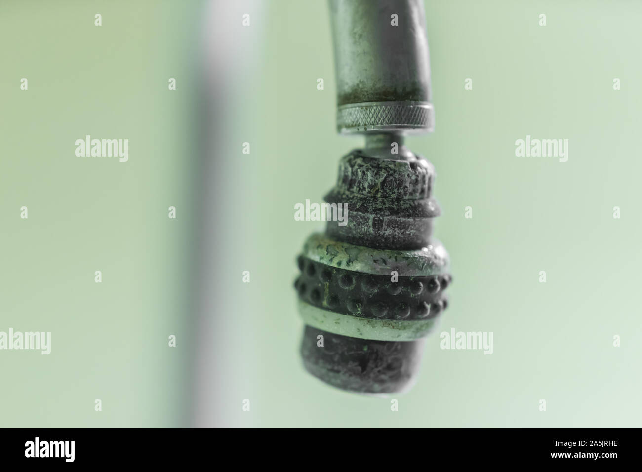 old water tap with a touch of lime Stock Photo Alamy