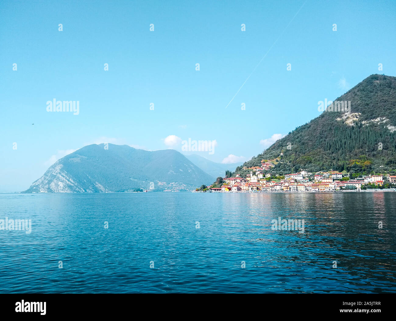 Sunny day on Lake Iseo (Lago d'Iseo) with the view of Monte Isola ...