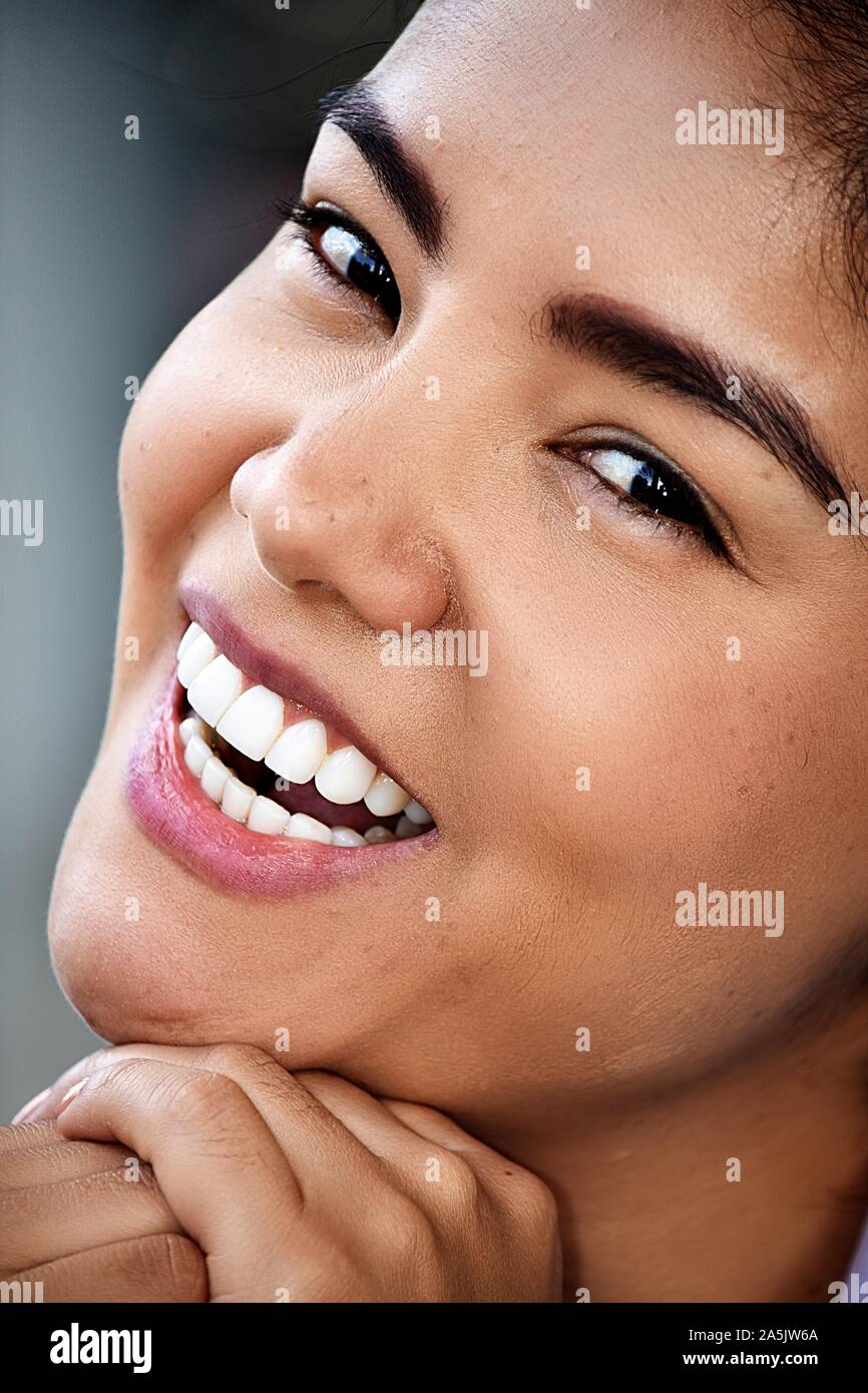 Smiling Face Of Young Happy Woman Stock Photo - Alamy