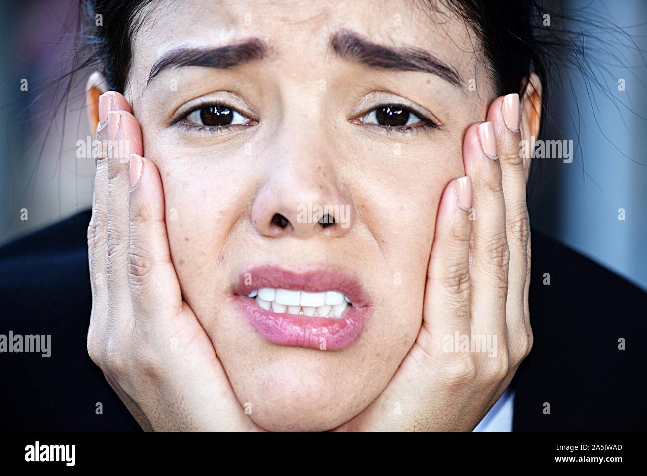 Minority Business Woman Under Stress Wearing Suit Stock Photo - Alamy