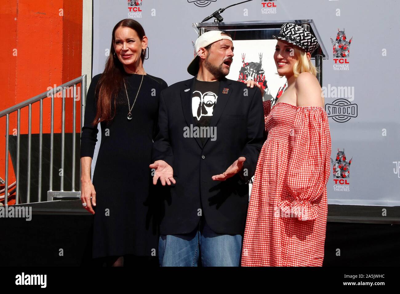 Los Angeles, CA. 14th Oct, 2019. Jennifer Schwalbach Smith, Kevin Smith, Harley Quinn Smith at the induction ceremony for Kevin Smith and Jason Mewes Handprint & Footprint Ceremony, TCL Chinese Theatre (formerly Grauman's), Los Angeles, CA October 14, 2019. Credit: Priscilla Grant/Everett Collection/Alamy Live News Stock Photo