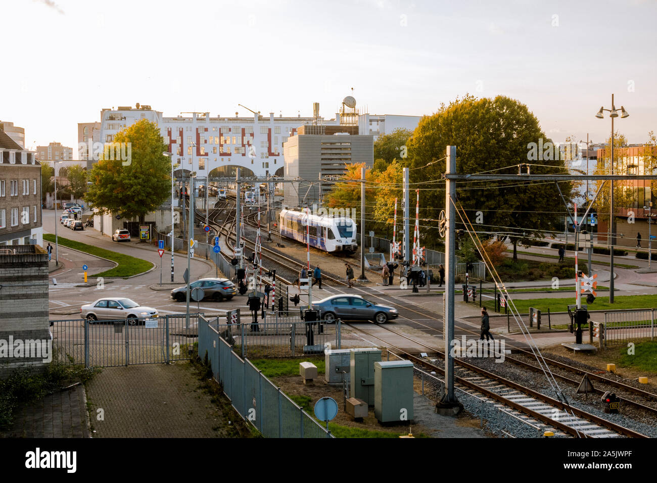 Cars crossin railway at Railway station, Heerlen, Limburg, Netherlands. Stock Photo