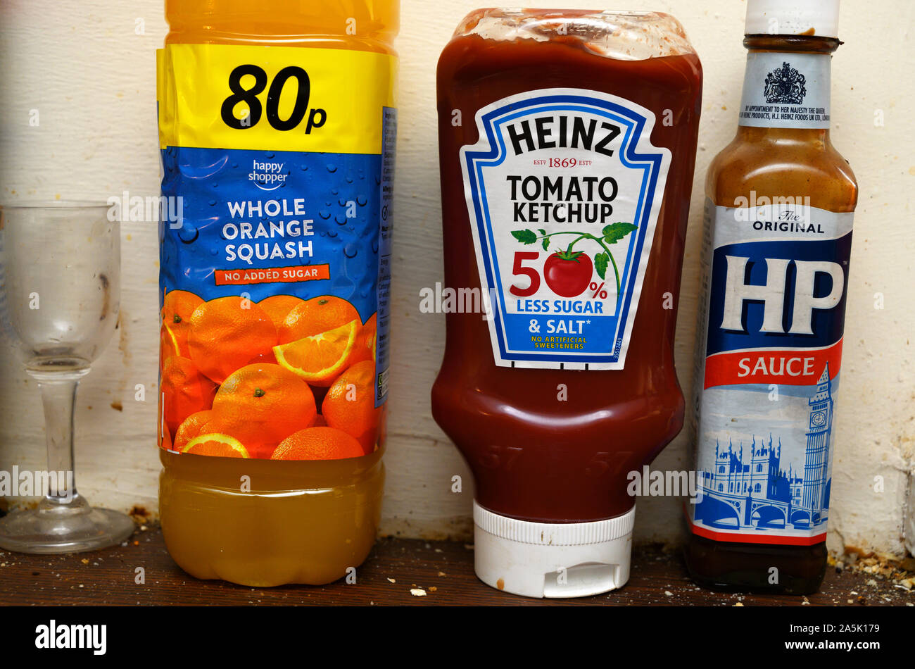 Orange squash, tomato and brown sauce bottles Stock Photo
