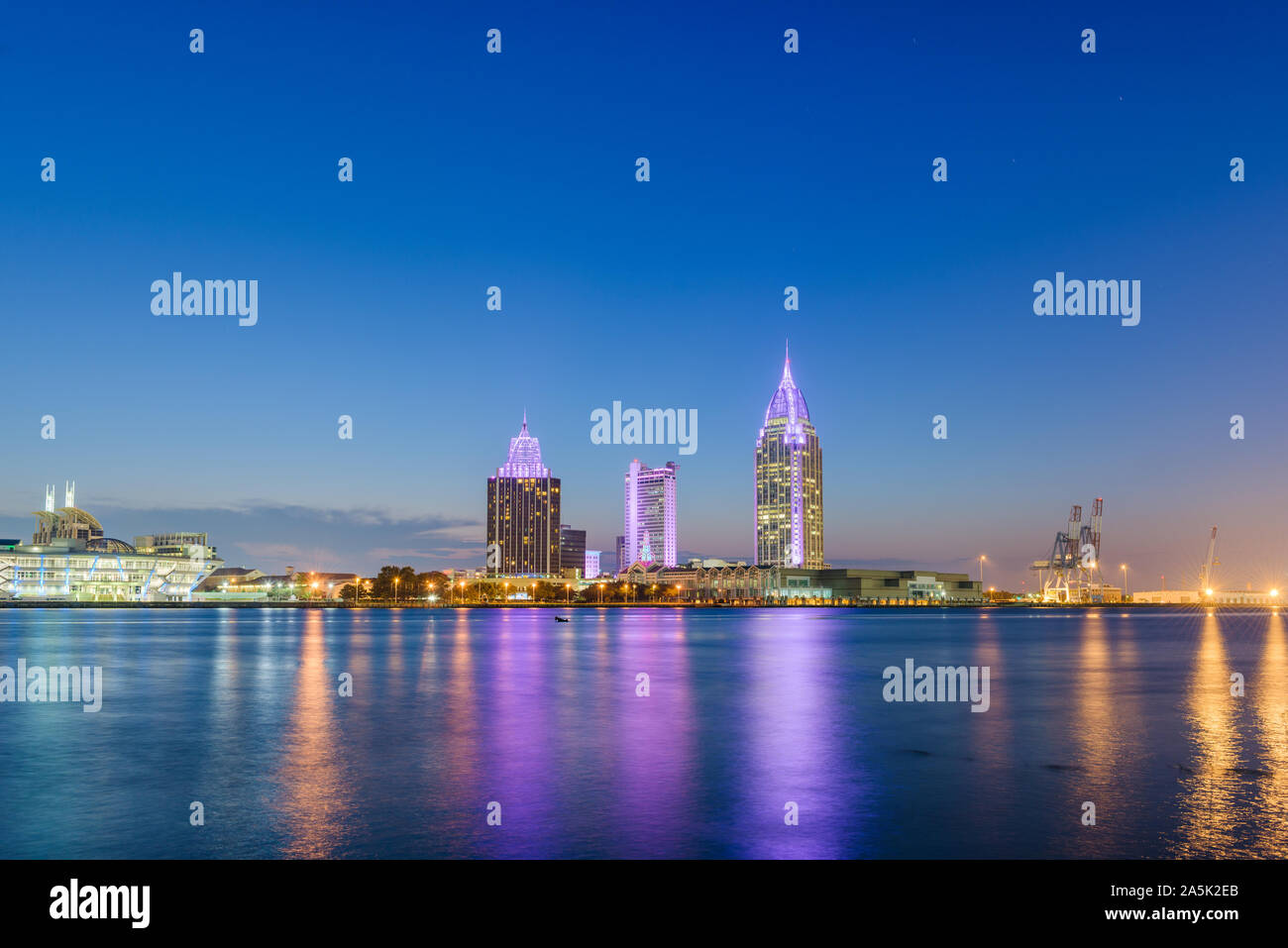 Mobile, Alabama, USA downtown city skyline on the Mobile River at