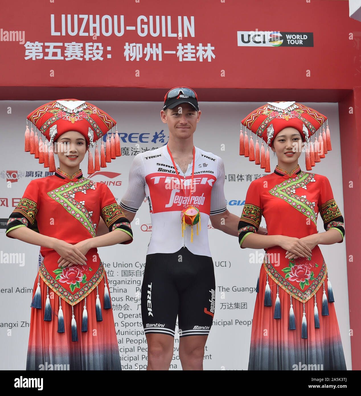 (191021) -- GUILIN, Oct. 21, 2019 (Xinhua) -- Ryan Mullen (C) of Team Trek-Segafredo poses for photograph during the awarding ceremony after the stage 5 at the 2019 UCI World Tour/Tour of Guangxi in Guilin, south China's Guangxi Zhuang Autonomous Region, Oct. 21, 2019. (Xinhua/Lei Jiaxing) Stock Photo