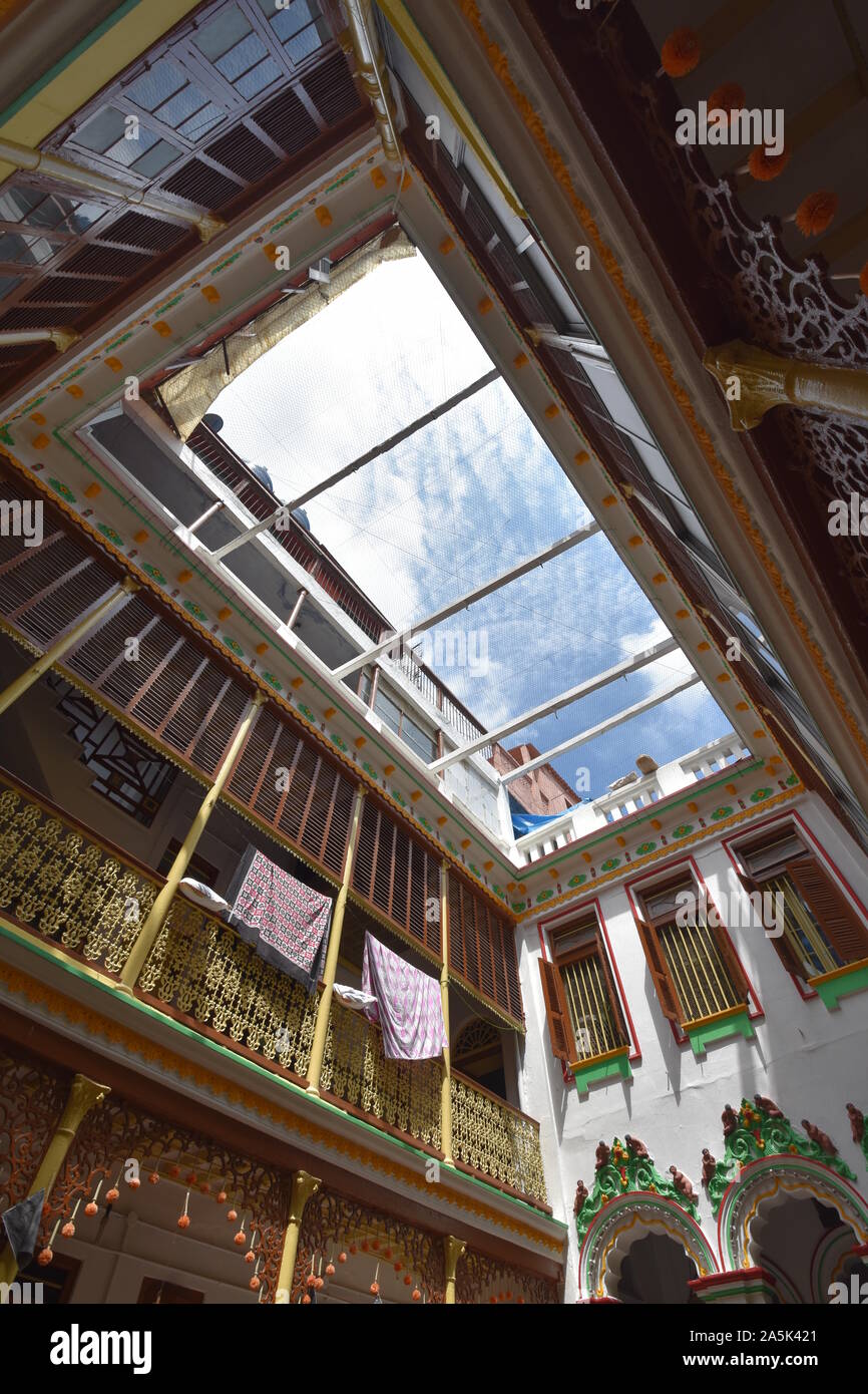 Autumn sky from courtyard of the Butto Kristo Dham. 77 Beniatola Street. Kolkata, West Bengal, India. Stock Photo