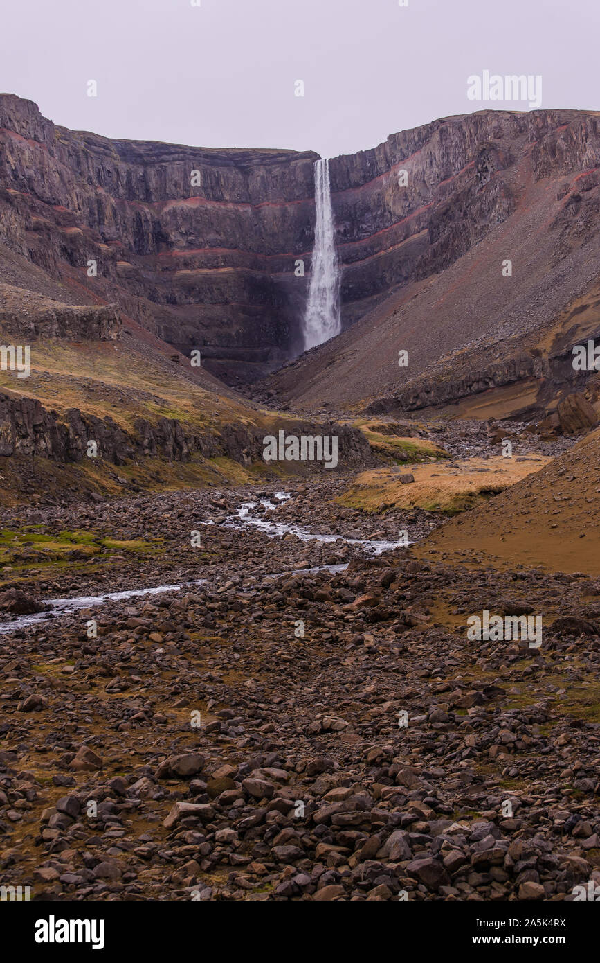 Valley landscape with rock formation waterfall, Hofn, Austur-Skaftafellssysla, Iceland Stock Photo