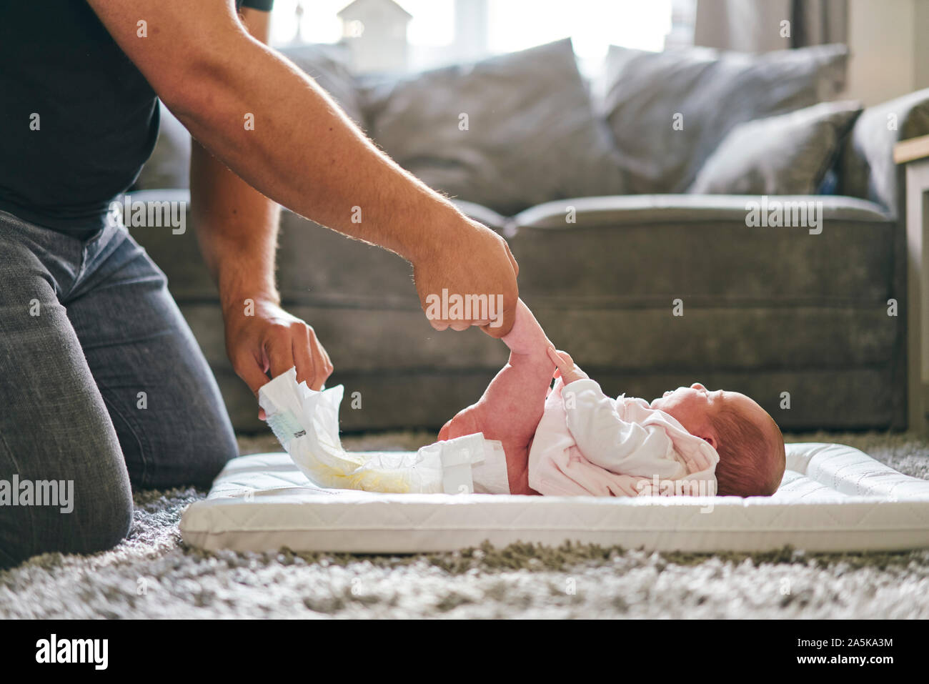Changing babys diaper hires stock photography and images Alamy