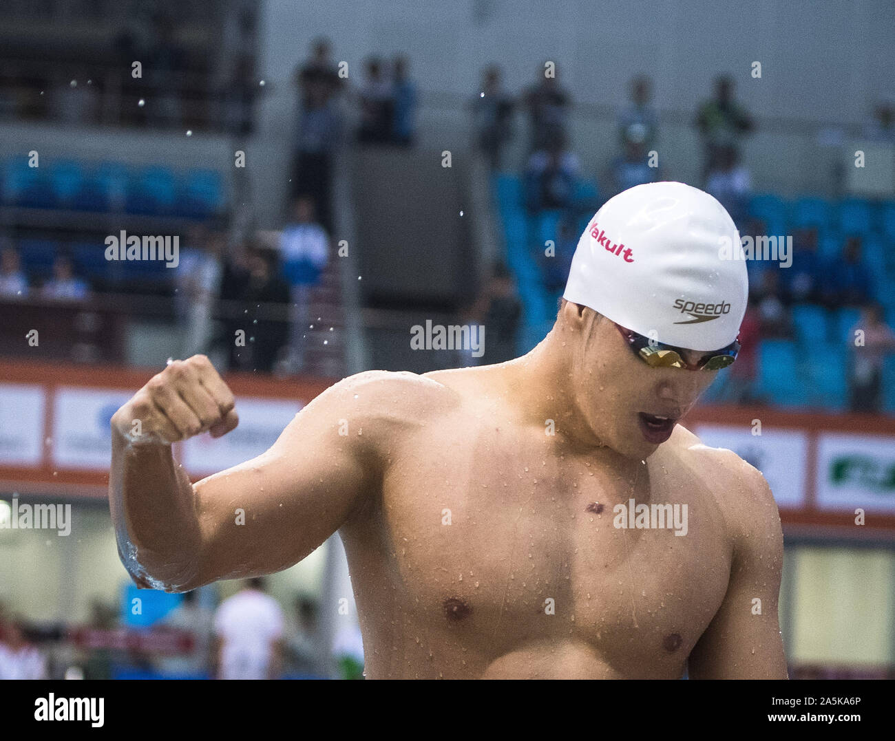 Wuhan, China's Hubei Province. 21st Oct, 2019. Ling Huanan of China celebrates after the men's 100m rescue medley final of lifesaving at the 7th CISM Military World Games in Wuhan, capital of central China's Hubei Province, Oct. 21, 2019. Credit: Xiao Yijiu/Xinhua/Alamy Live News Stock Photo