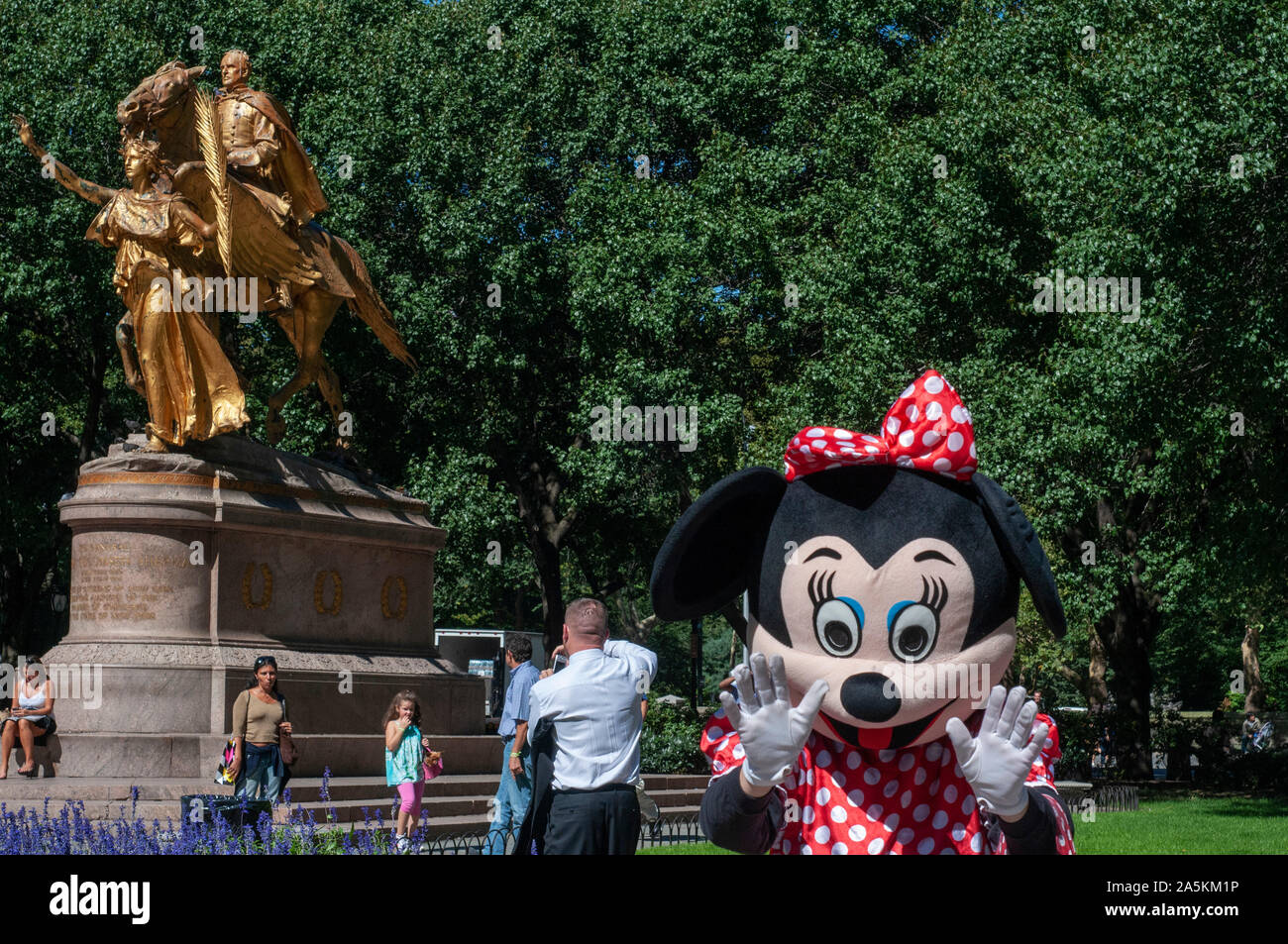 Minnie at Central Park. The famous General William Tecumseh Sherman Statue opposite The Plaza Hotel. Central Park is arguably the most cinematic world Stock Photo