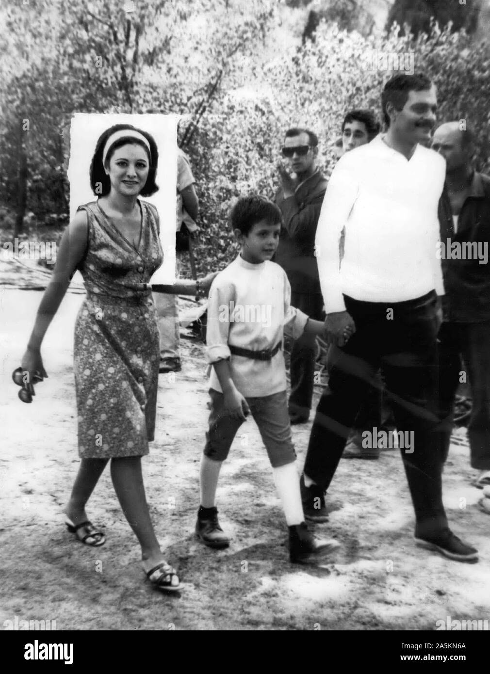 Dec. 29, 1978 - Spain - OMAR SHARIF walks with his wife, FATEN HAMAMA and their son TAREK SHARIF while in Spain. (Credit Image: © Keystone Pictures USA/ZUMAPRESS.com) Stock Photo