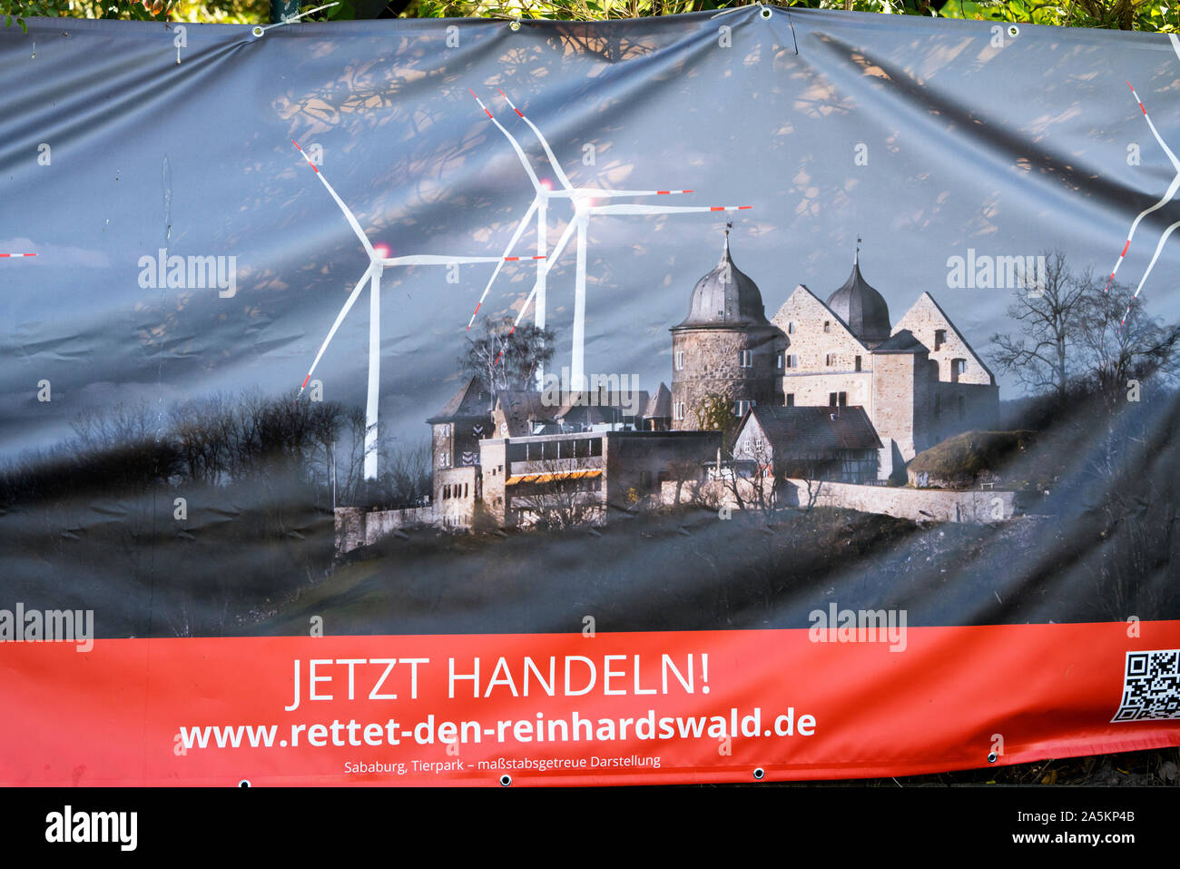 Protest poster against wind turbines in Reinhardswald, Oberweser, Upper Weser Valley,  Weser Uplands, Weserbergland, Hesse, Germany Stock Photo