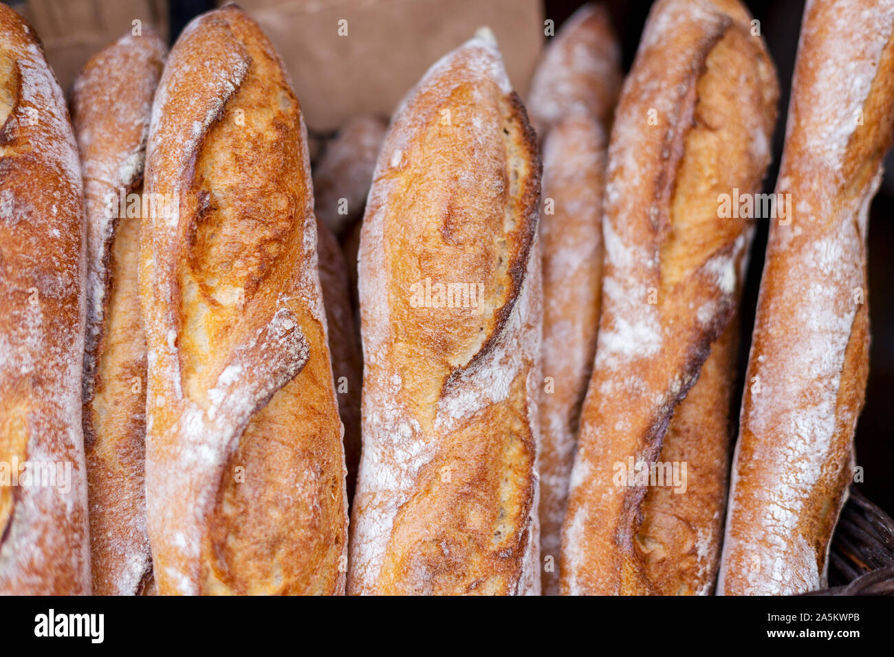 Fresh tasty Baguettes on street food market. Concept of french delicious food Stock Photo