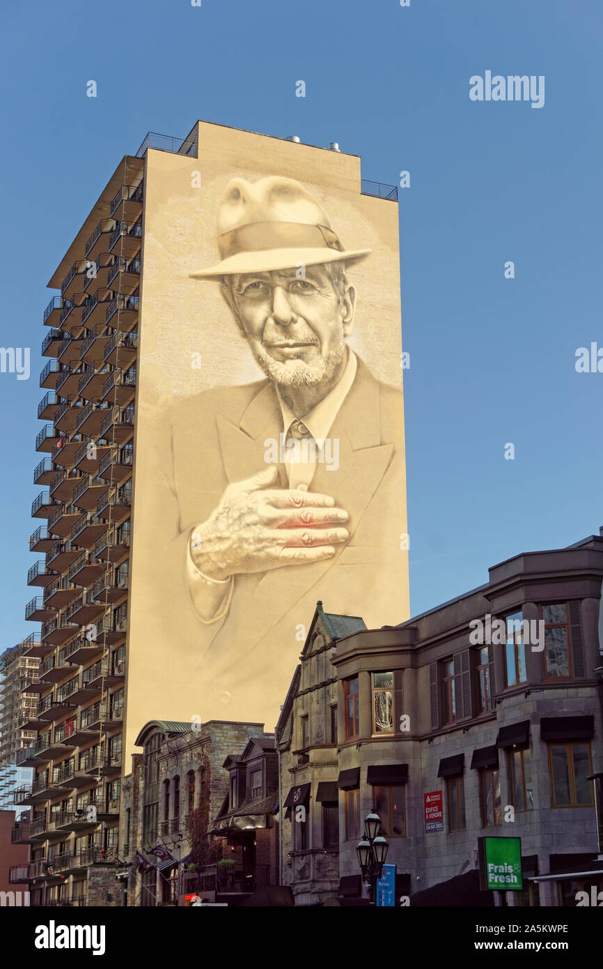 Huge Leonard Cohen mural painted on the side of a tall building on Crescent Street in downtown Montreal, Quebec, Canada Stock Photo
