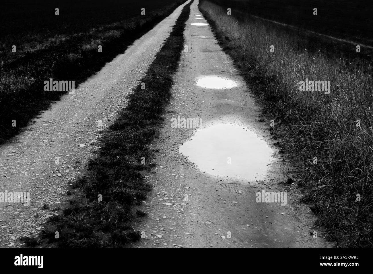 Puddles In Road High Resolution Stock Photography and Images - Alamy