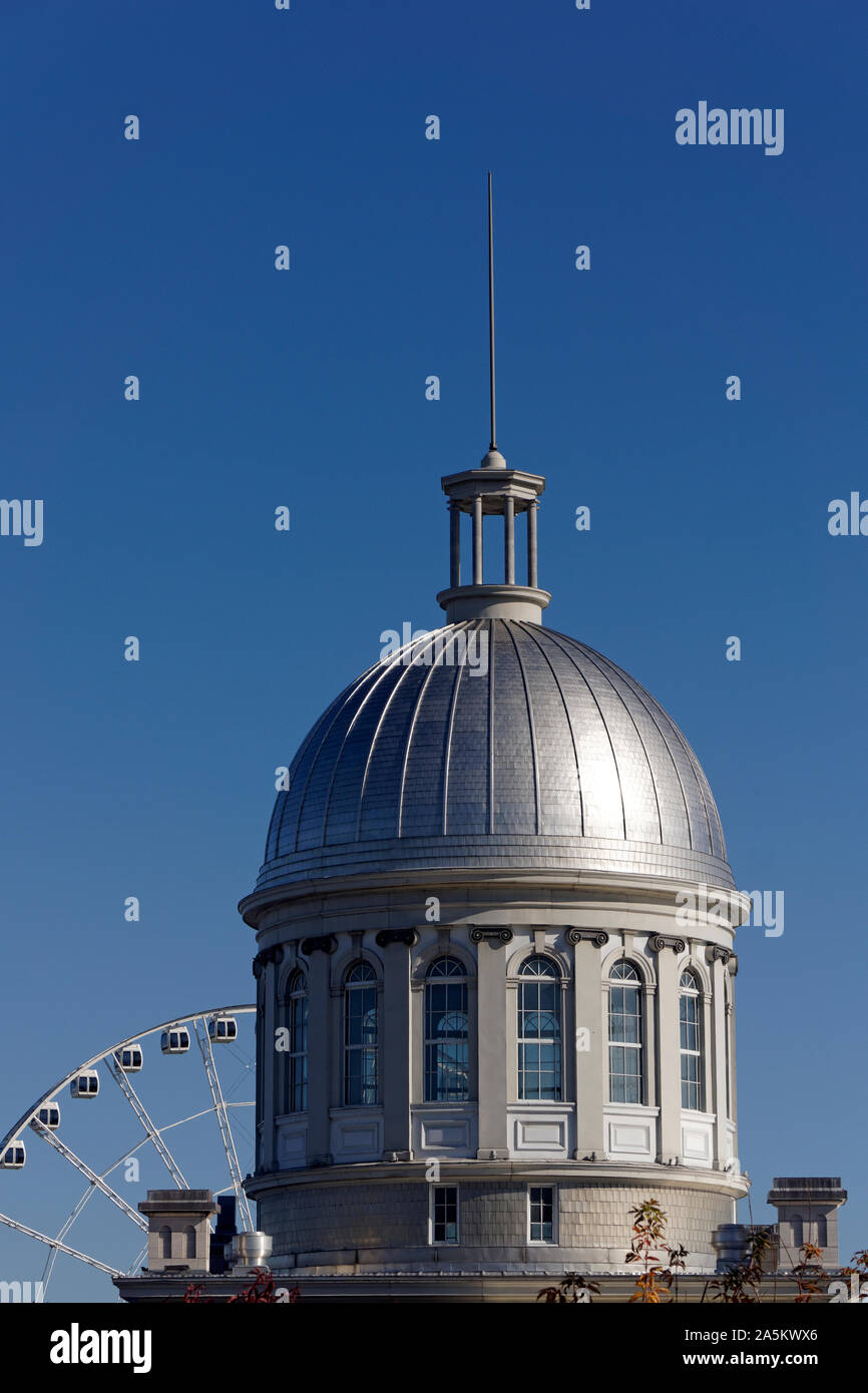 Dome of the Marche Bonsecours market with La Grande Roue de Montreal ferris wheel in the background, Old Montreal, Quebec, Canada Stock Photo