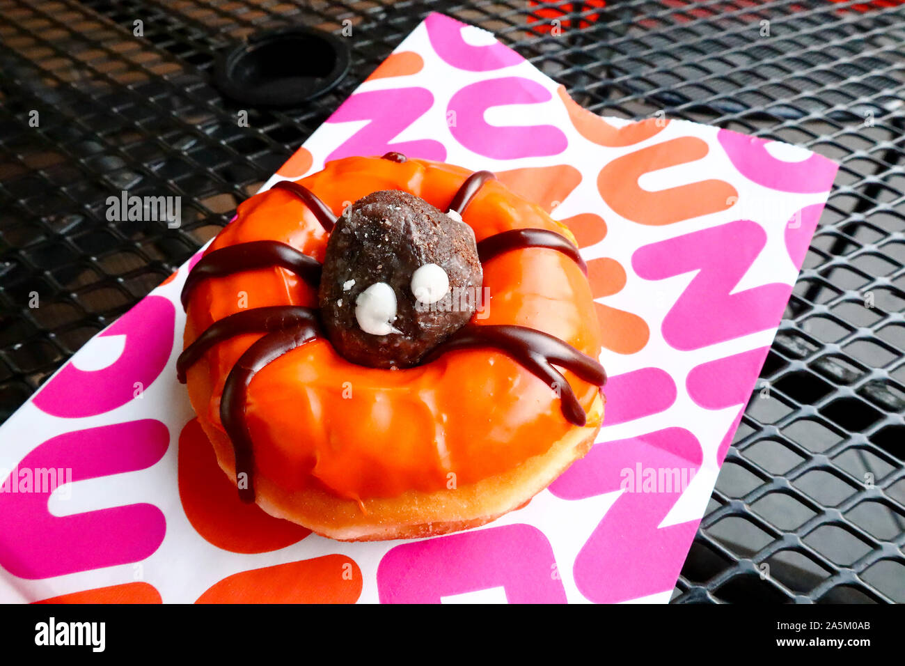 DUNKIN' DONUTS, Dunkin' Spider Donut creation for Halloween Stock Photo