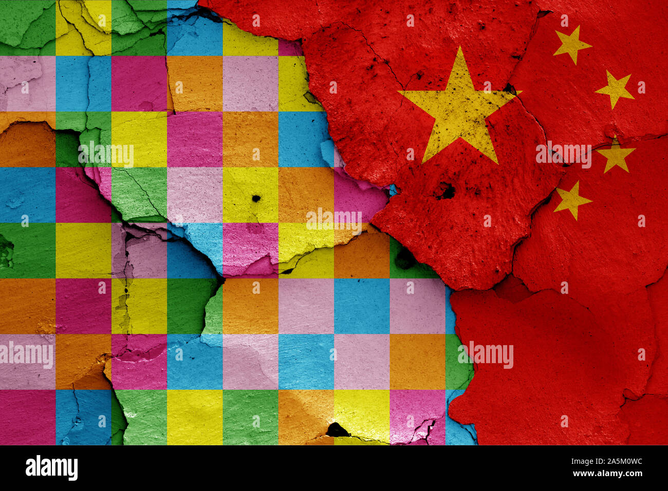 depiction of Lennon wall flag and China painted on cracked wall Stock Photo