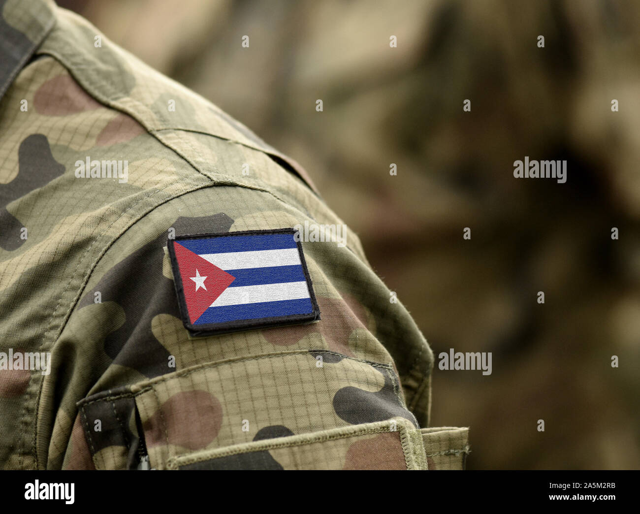 Flag of Cuba on military uniform. Army, troops, soldier (collage). Stock Photo