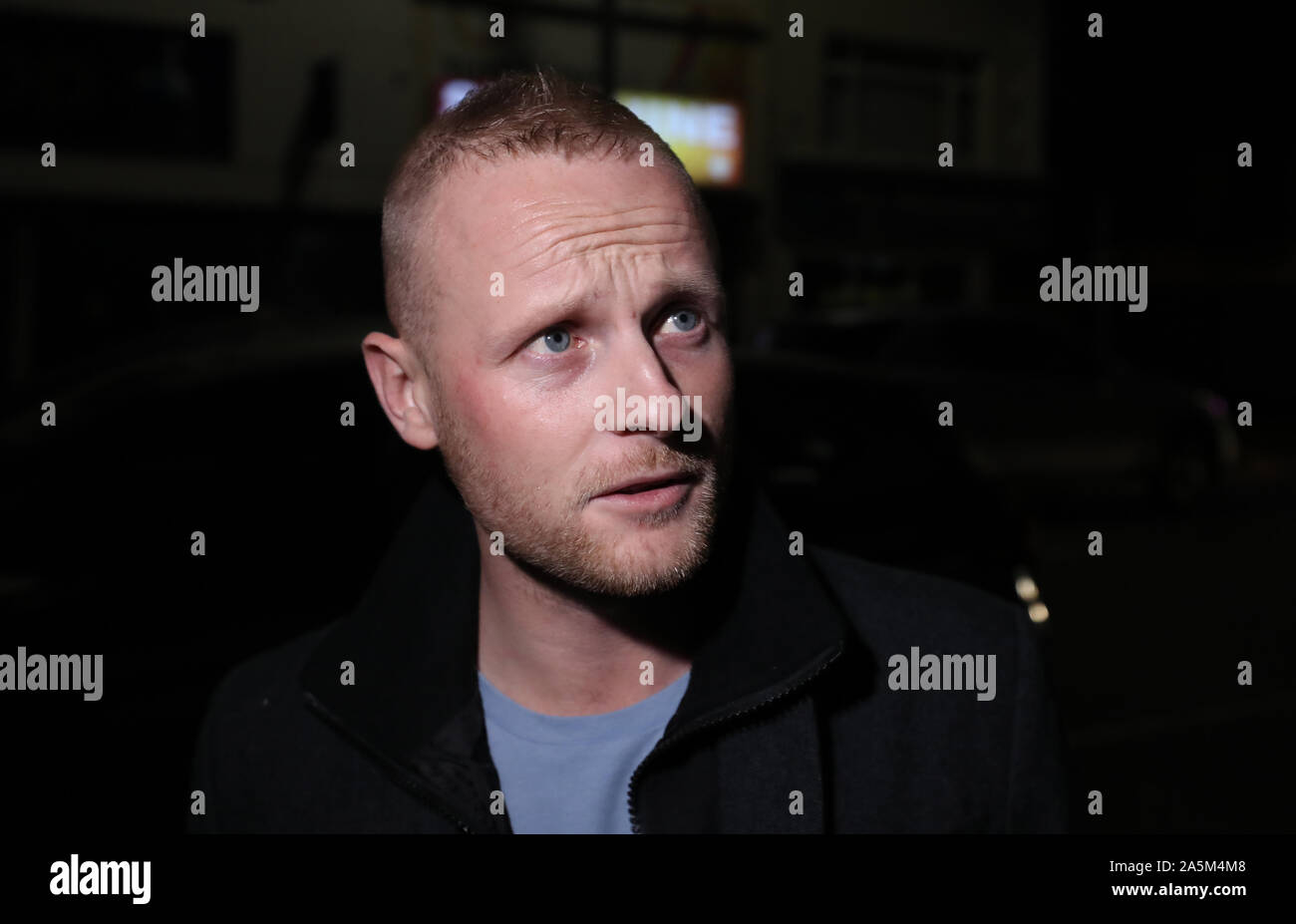 Blogger Jamie Bryson speaks to the media as Loyalists gather to discuss their response to Boris Johnson's deal at East Belfasts Constitutional club. Stock Photo