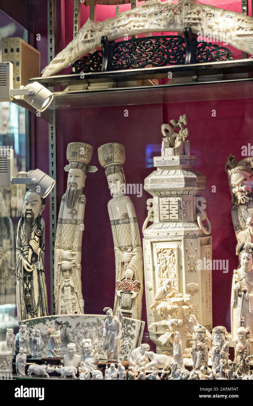 A Chinese shop selling carved ivory products in Central District of Hong Kong. Stock Photo