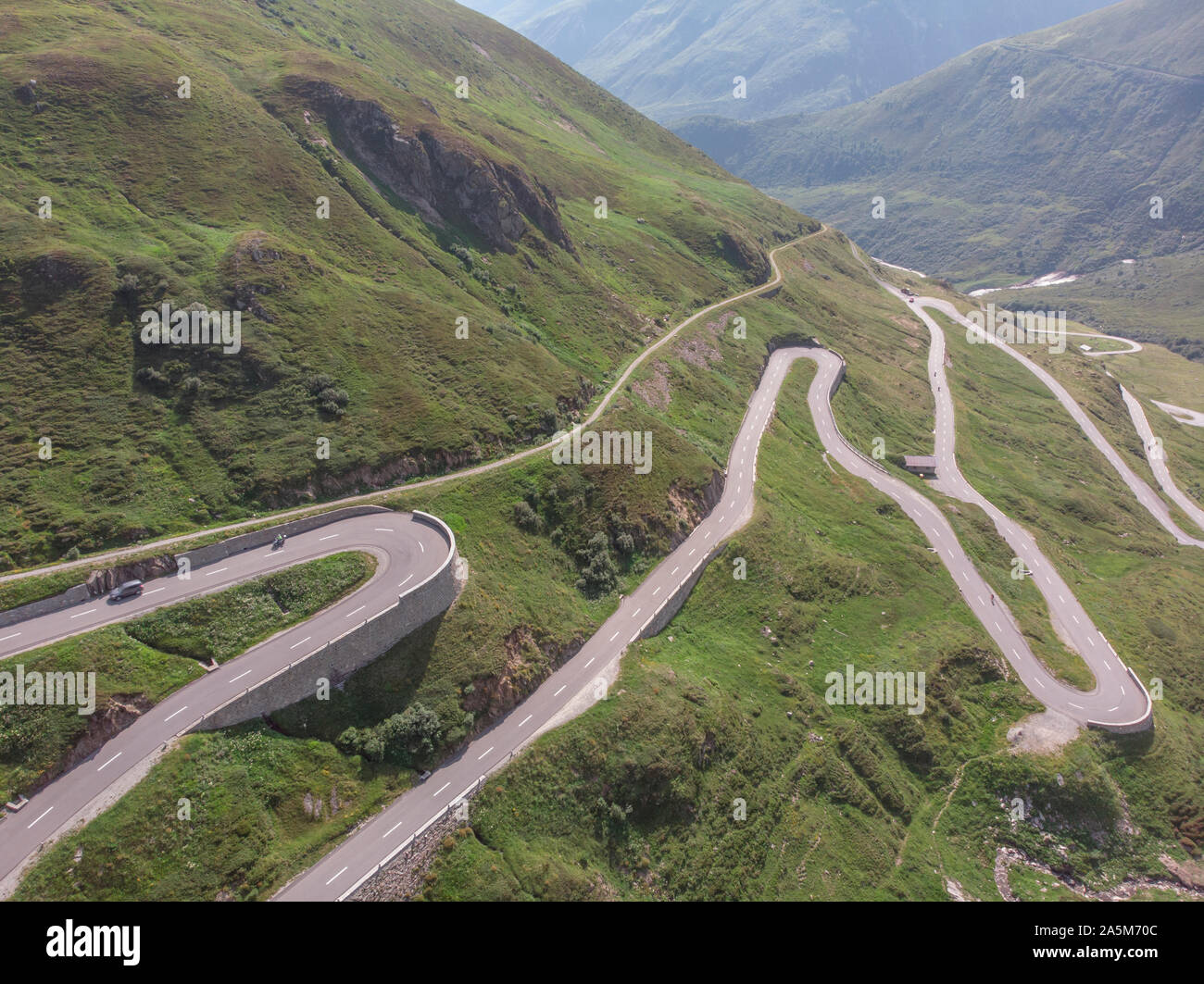Man car winding road mountain hi-res stock photography and images - Alamy