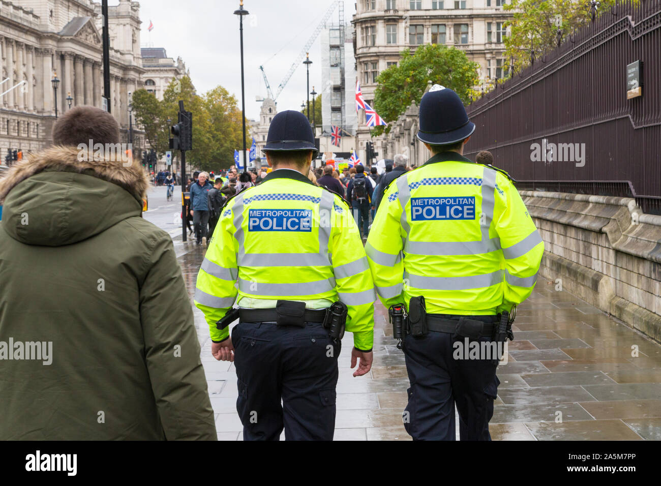Metropolitan police, patrolling policemen, hi vis jacket police officers, westminster, london, uk Stock Photo