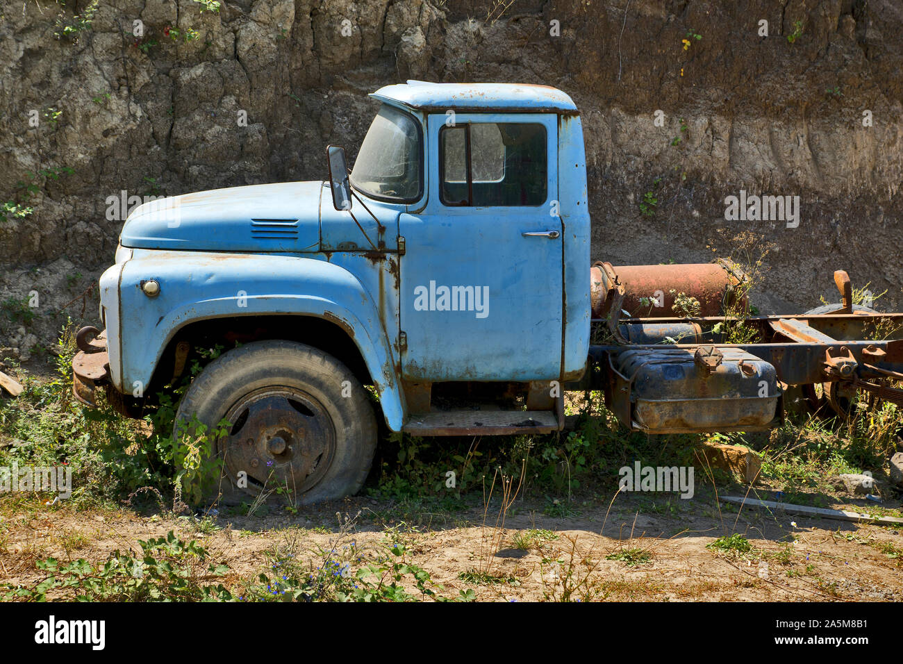 Armenia: grunge soviet truck on the roadside Stock Photo