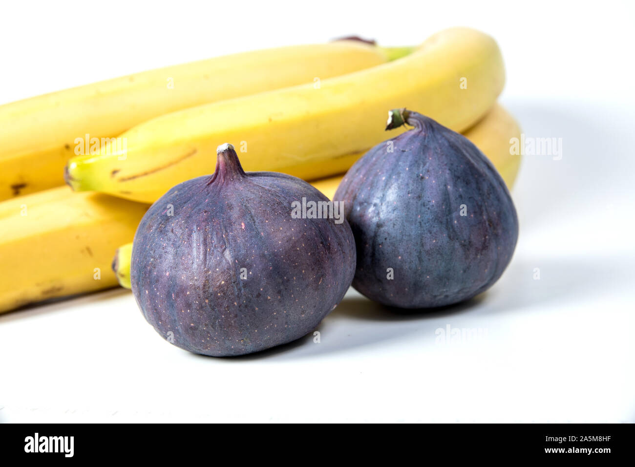 figs and bananas, beautiful fruits, bananas, purple figs, close-up, vitamins concept, vegan food, healthy eating, Stock Photo