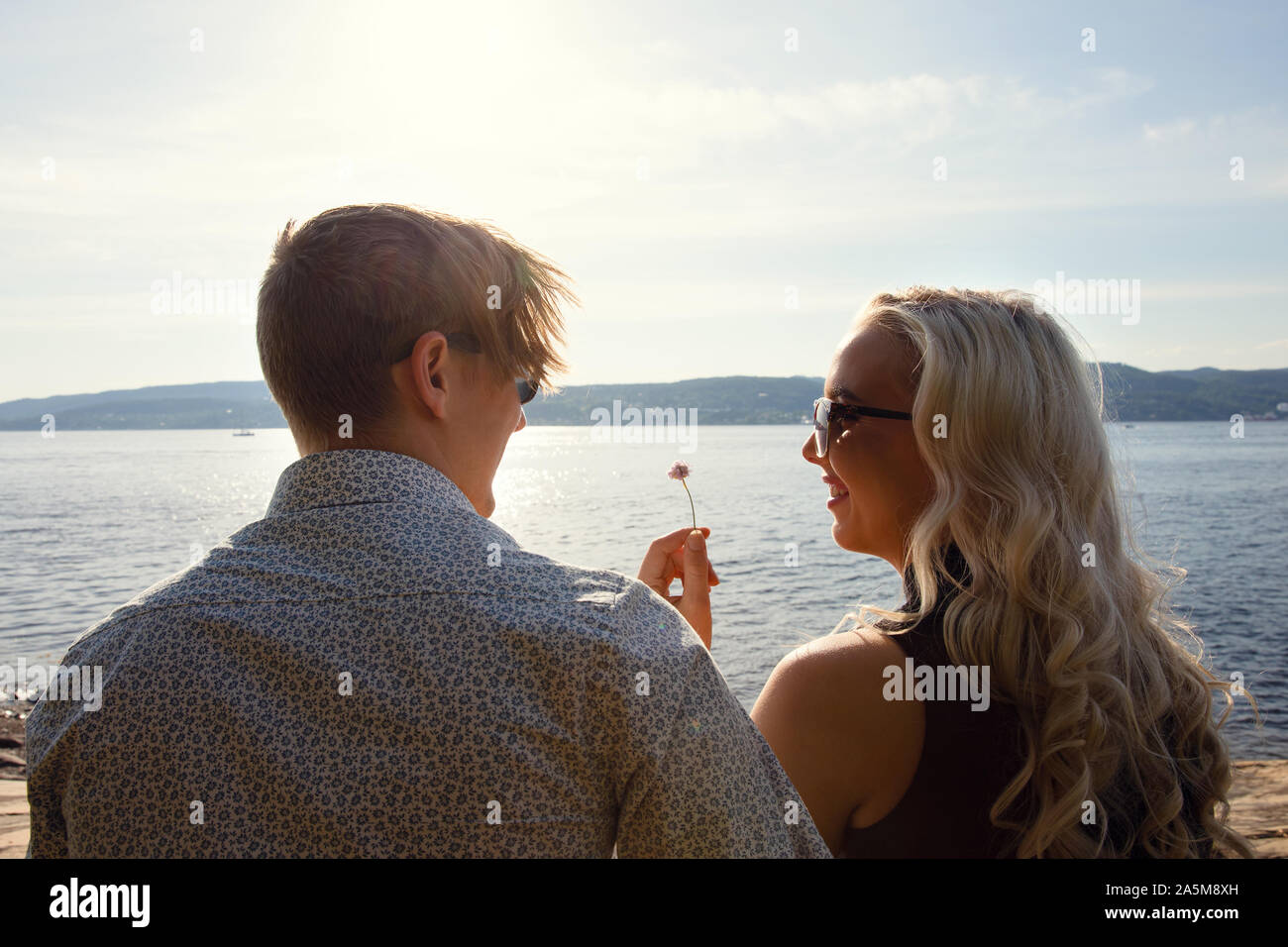 Romantic Young Couple Sharing Leisure Time At Beach Stock Photo Alamy