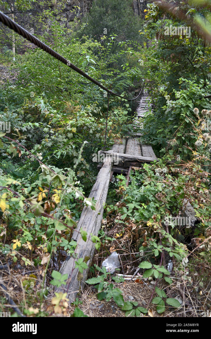 Armenia, Caucasus: broken hang-bridge in Caucasus Stock Photo
