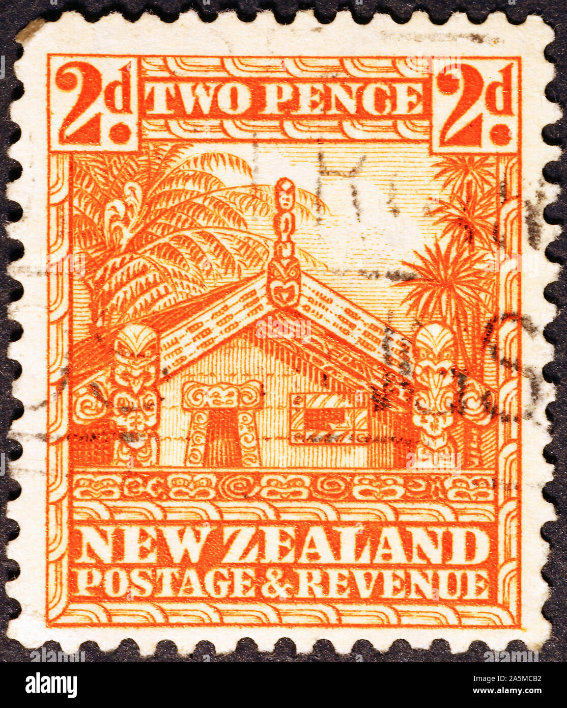 Maori house on vintage new zealand postage stamp Stock Photo