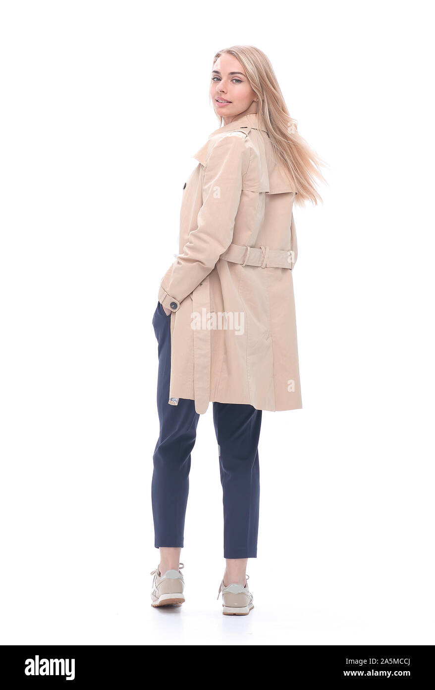 Trendy woman standing rear view Cut Out Stock Images & Pictures - Alamy