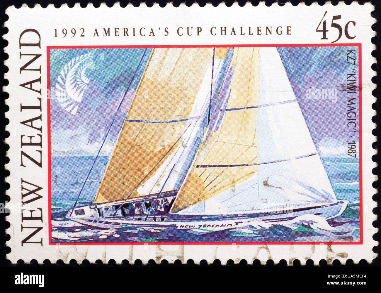 Sailboat racing on New Zealand postage stamp Stock Photo
