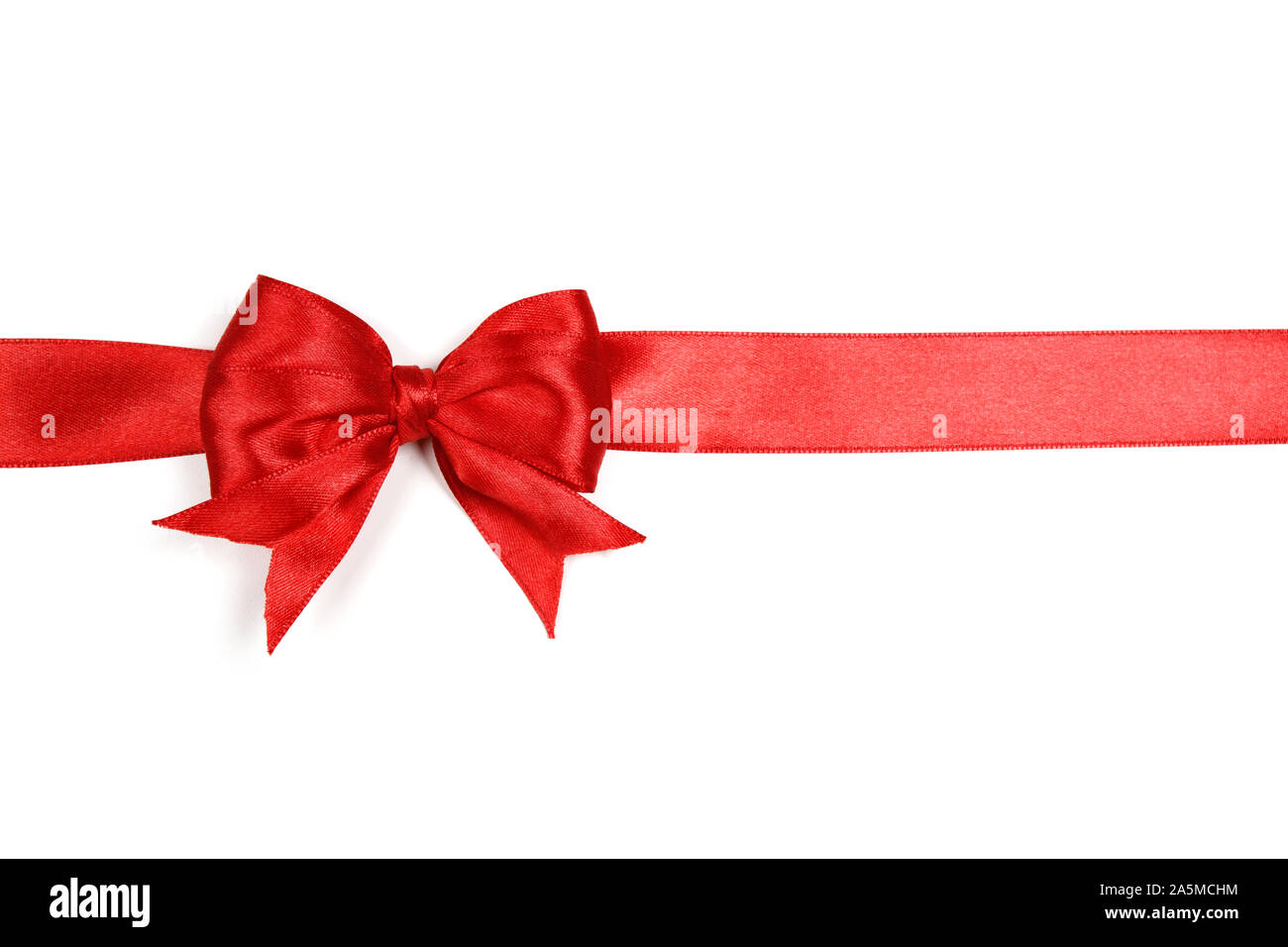 Shiny red satin ribbon isolated on white background Stock Photo - Alamy