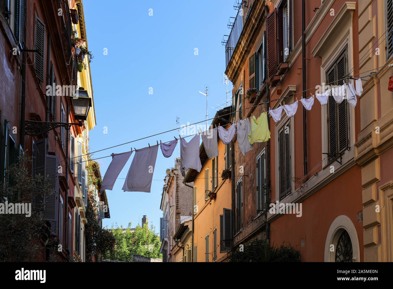 Clothes line between buildings hires stock photography and images Alamy