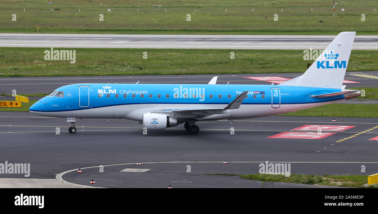 DUSSELDORF, GERMANY - MAY 26, 2019: KLM Cityhopper Embraer 175STD (CN 639) taxi in Dusseldorf Airport. Stock Photo