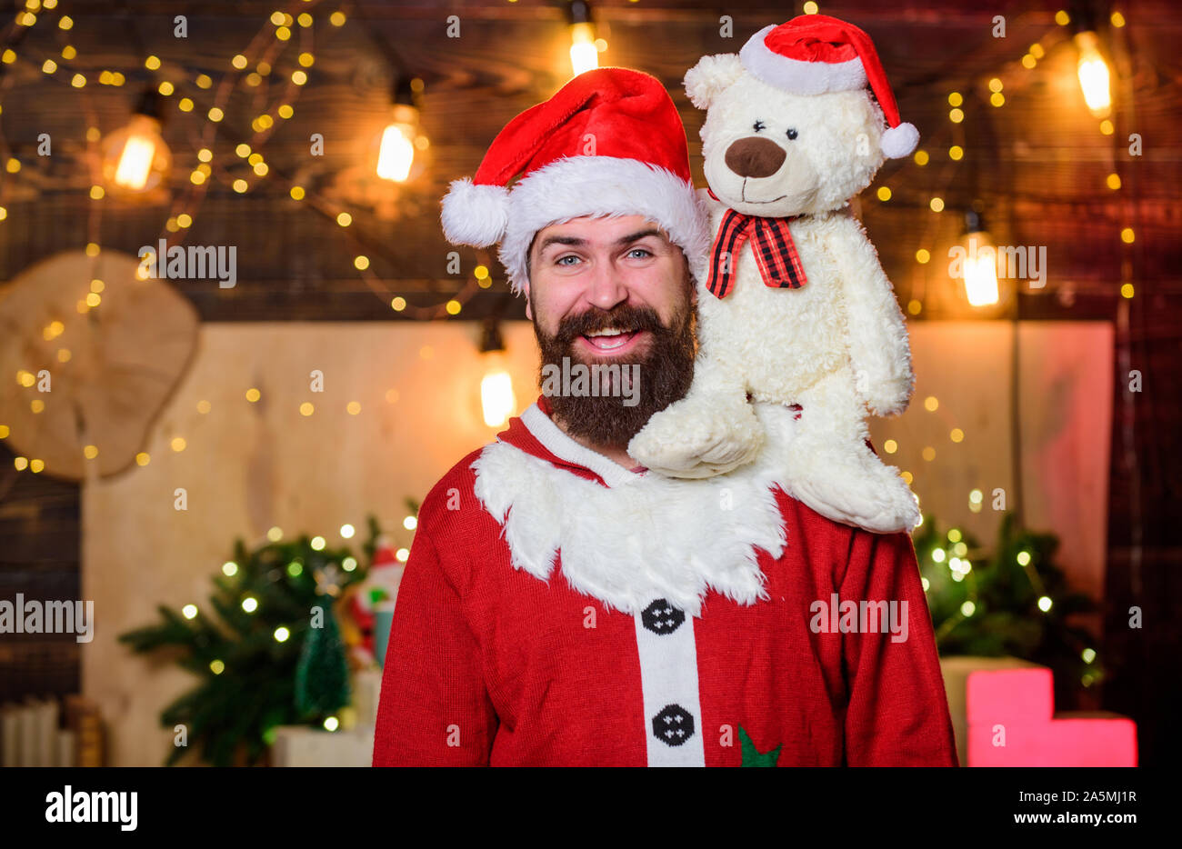 Kindness and generosity. Charity concept. Man bearded Santa claus play