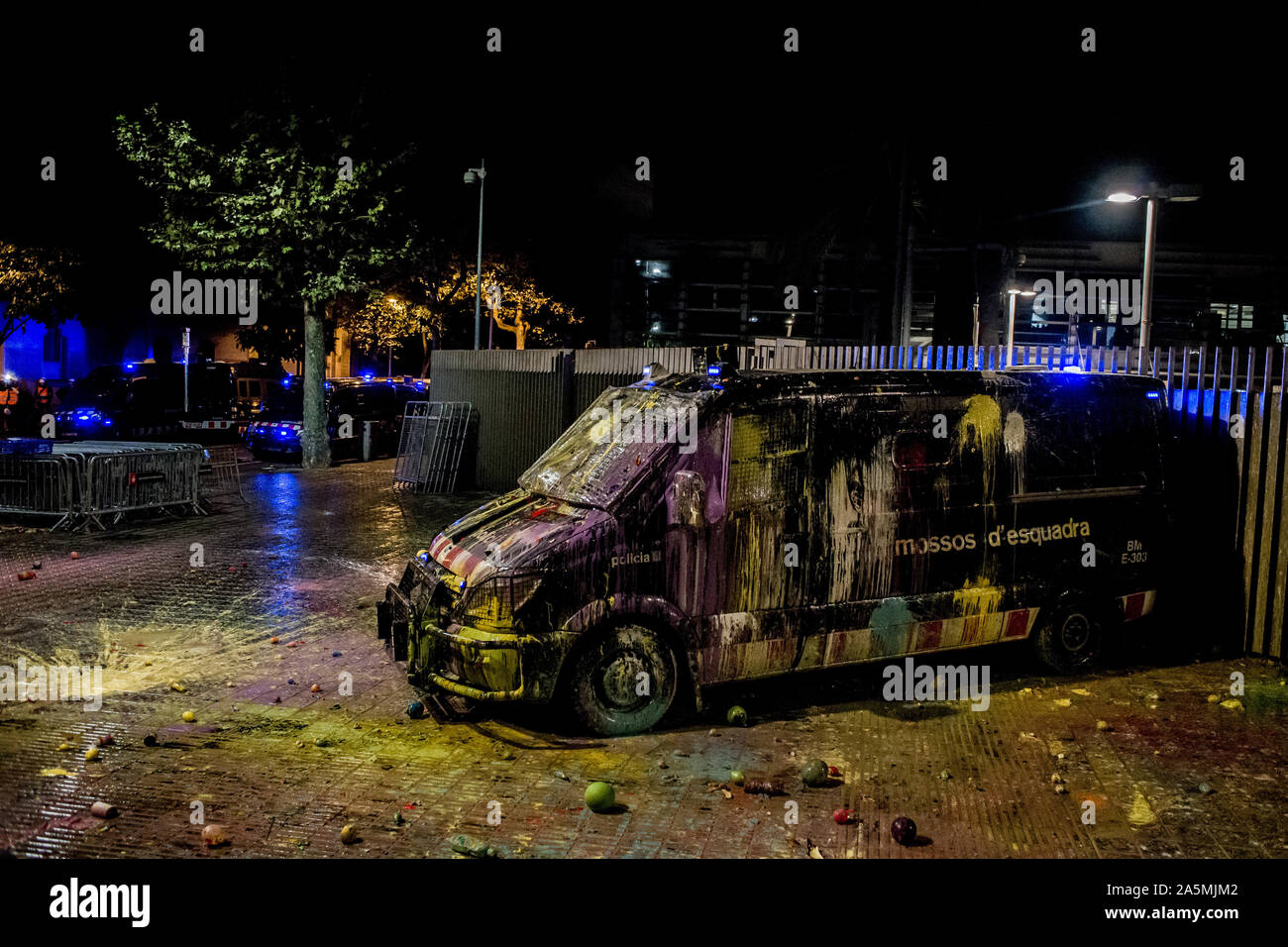 A Catalan regional police van appears covered in paint during a protest in Barcelona. Demonstrators gathered outside the Catalan interior ministry to denounce police brutality during last week protests. Protests took place throughout the Catalan territory after Spanish Supreme Court ruled to sentence nine Catalan politicians, involved in organizing the 2017 independence referendum, to 9-13 years in prison. Stock Photo