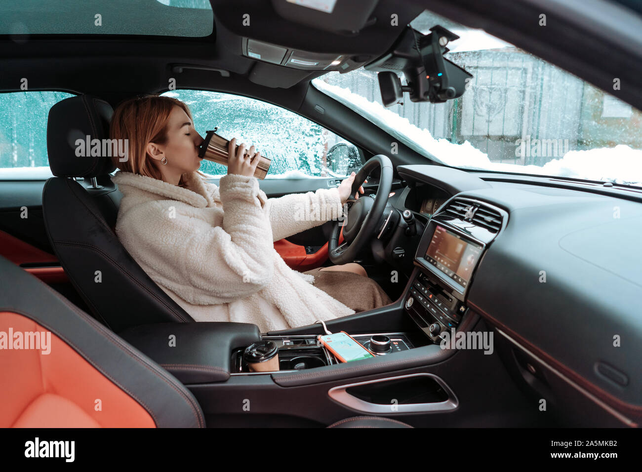 Girl behind steering wheel hi-res stock photography and images - Alamy
