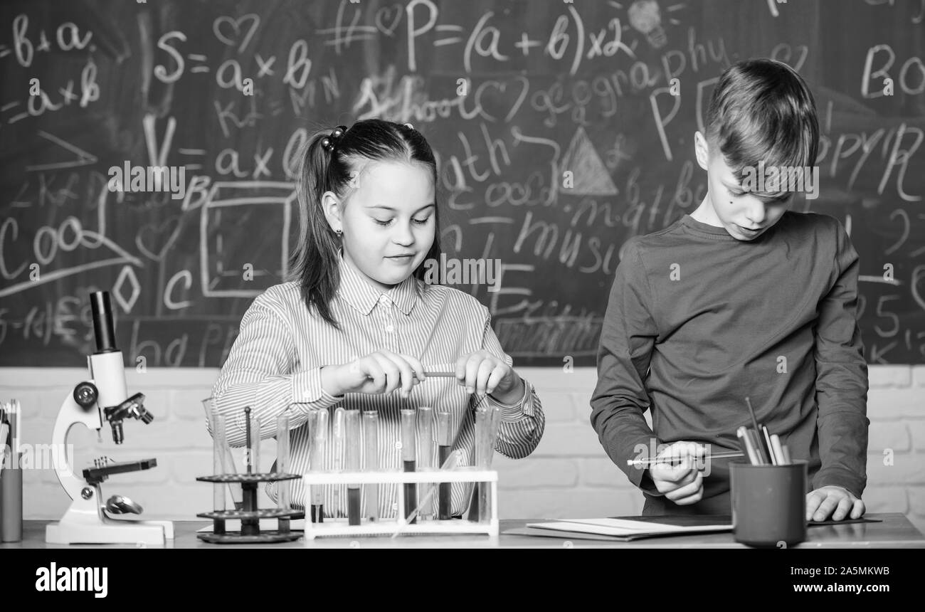 Biology equipment. Happy children. Biology lesson. students doing