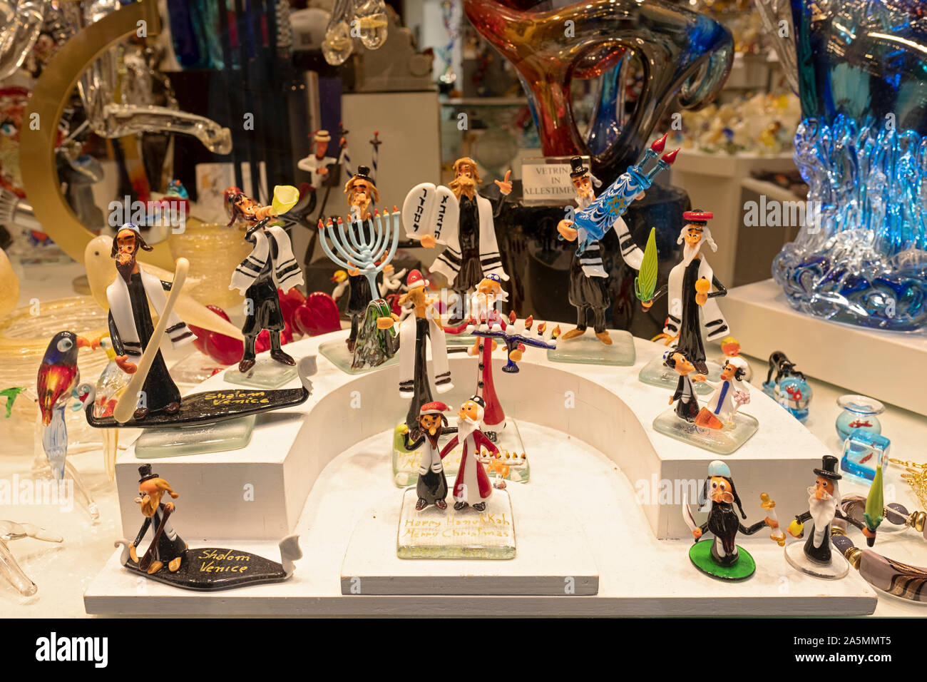 A display of Murano small Murano glass sculptures with Jewish themes. In Venice, Italy. Stock Photo