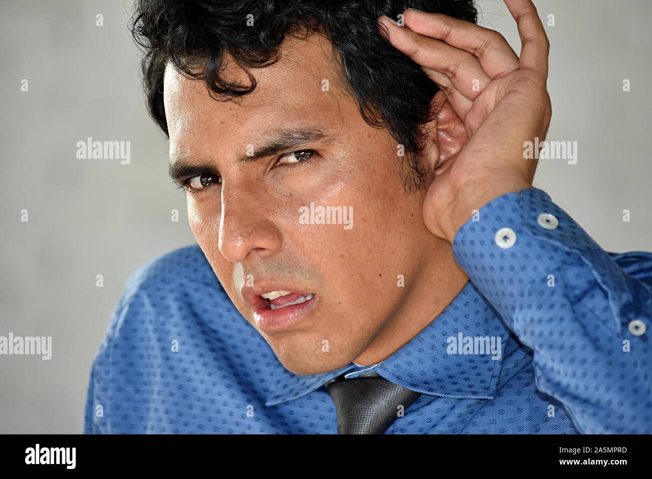 Handsome Business Man Hearing Wearing Tie Stock Photo