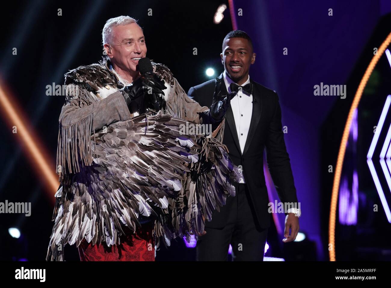 THE MASKED SINGER, from left Dr. Drew Pinsky (revealed as the Eagle