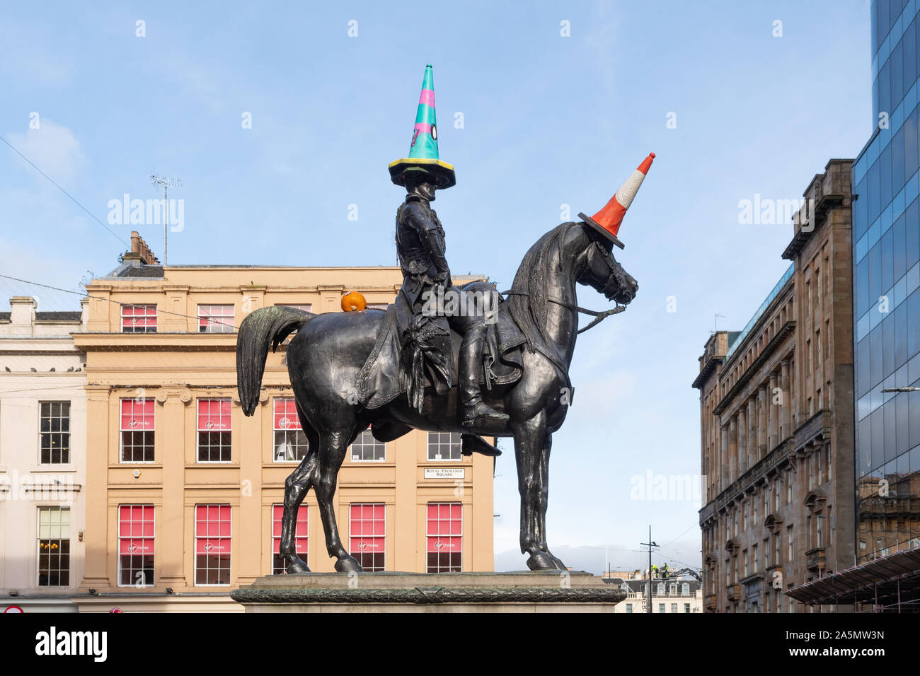 Duke of Wellington Statue with traditional traffic cone and halloween theme decorations, Glasgow, Scotland, UK Stock Photo
