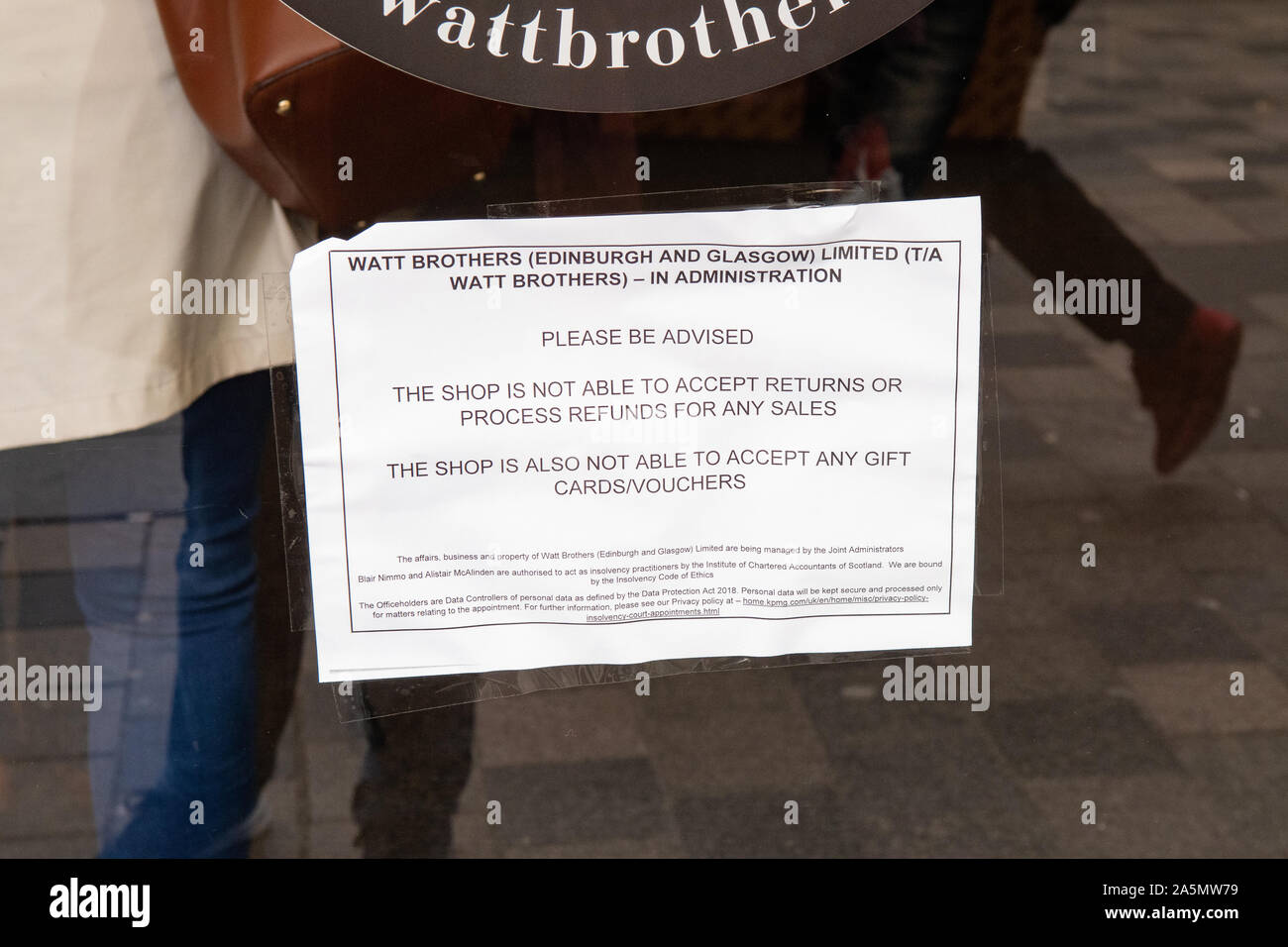 sign on door of Watt Brothers department store after going into administration saying no returns, refunds or gift cards Stock Photo