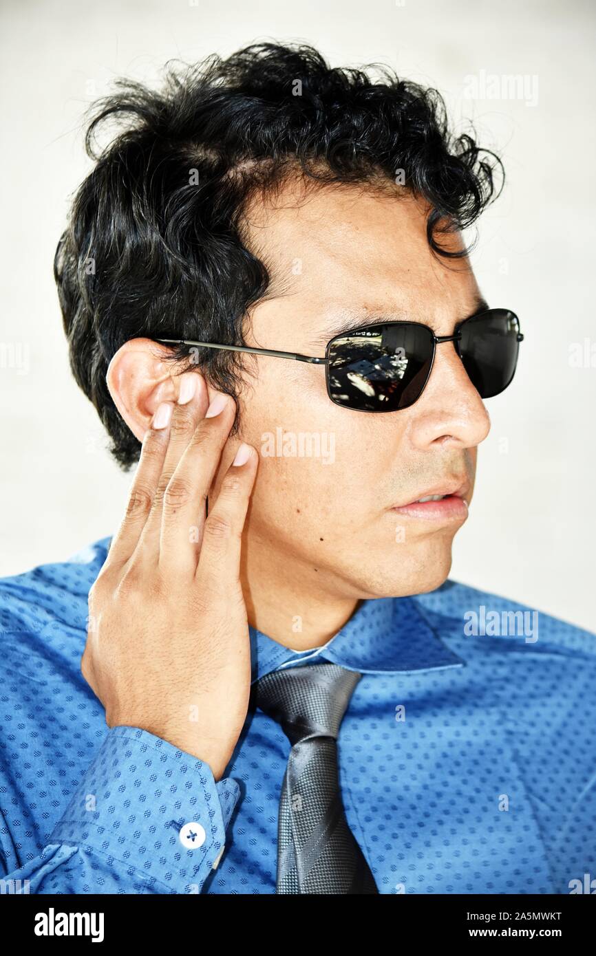 Security Guard Hearing Wearing Sunglasses Stock Photo Alamy